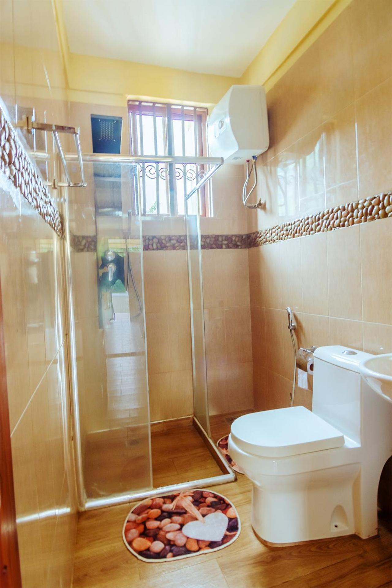 Rayan Apartments & Safaris Arusha Szoba fotó