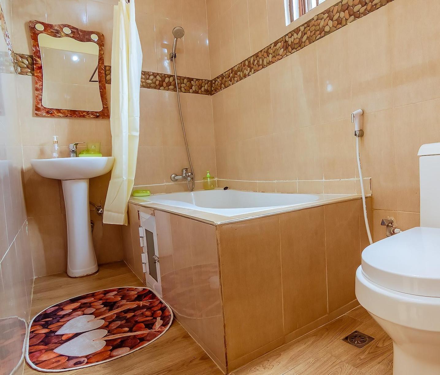 Rayan Apartments & Safaris Arusha Szoba fotó