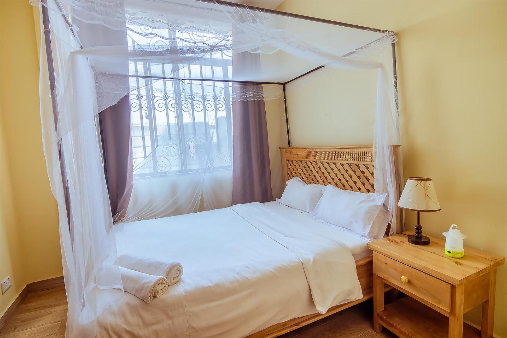 Rayan Apartments & Safaris Arusha Szoba fotó